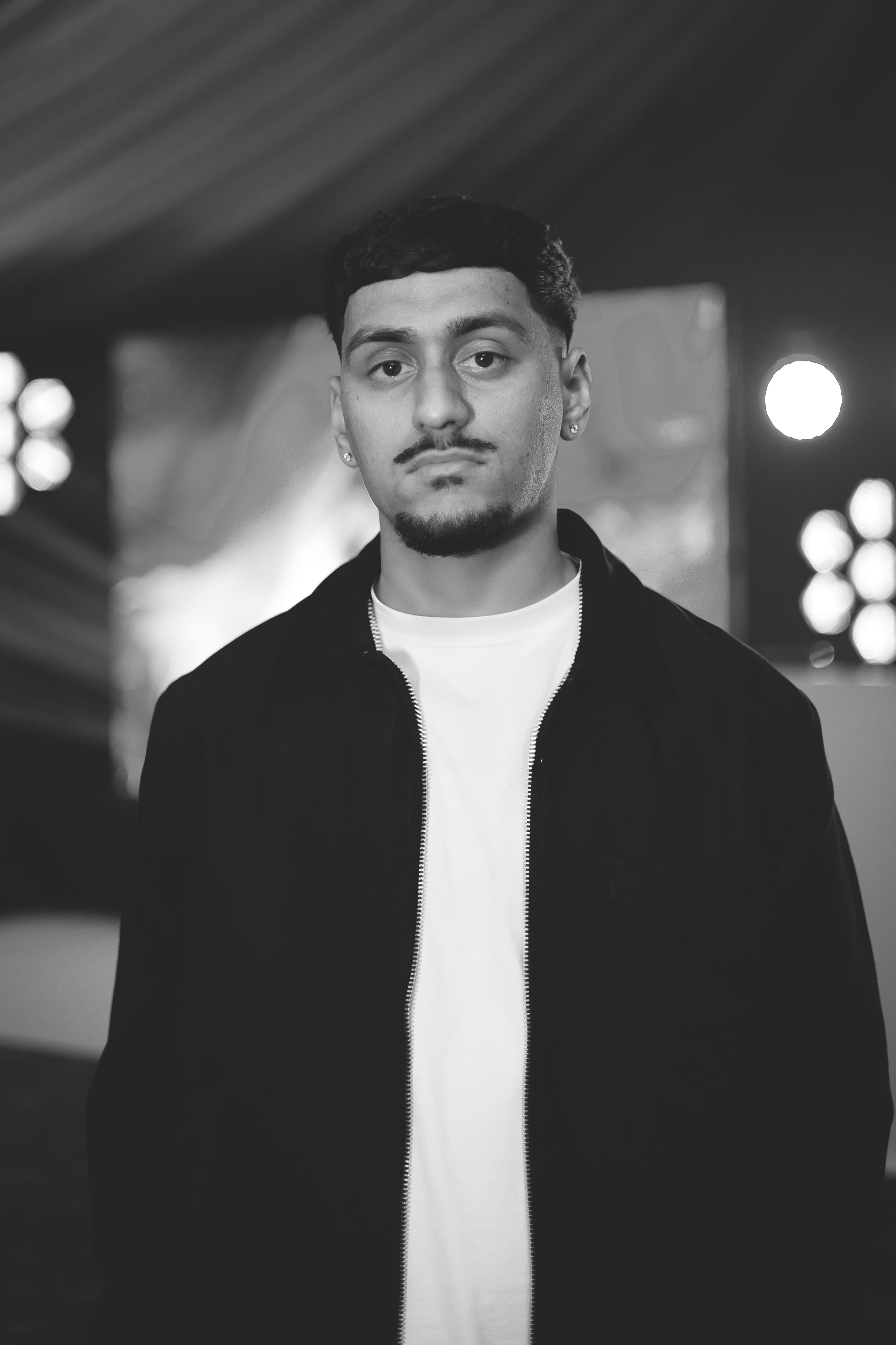 Headshot portrait of DJ AJ